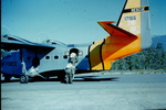 Portland Search and Rescue Crew loading into an airplane by Jim Allen