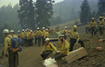 Smokejumpers preparing to fight the Hog Fire in the Klamath National Forest by Douglas Beck