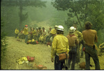 Several members of the ground crew take a break during the Hog Fire in the Klamath National Forest by Douglas Beck