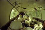 Smokejumpers in the cabin of a Beech 99 during a practice jump by Douglas Beck