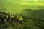 Smokejumpers wait for a fire retardant near jump spot by Douglas Beck