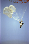 Smokejumper deploying reserve during parachute training by Douglas Beck