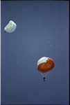 Smokejumper releasing reserve during parachute training by Douglas Beck