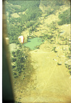 Smokejumper deploying parachute by Douglas Beck