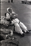 Terry Mewhinney resting on the tarmac by Douglas Beck