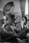 Smokejumpers in a DC-3 cabin by Douglas Beck