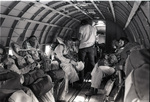 Smokejumpers inside a DC-3 plane by Douglas Beck