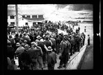 Workers stand outside a building near Grand Coulee Dam by Hubert Blonk