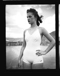 Woman in a swimsuit near Grand Coulee Dam by Hubert Blonk