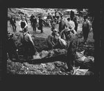 Workers laying sandbags by Hubert Blonk