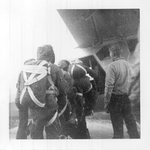 Cliff Marshall and Other Smokejumpers Boarding a Transport Plane during the Kimball Hill Fire by Albert Boucher