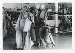 Jump gear hung up in a parachute loft by unknown
