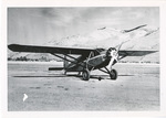 Single prop airplane in air field by unknown