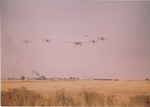 Formation of airplanes led by a Ford Trimotor by unknown