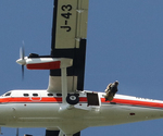 13. Smokejumper just after exit from Twin Otter transport aircraft by Ted Corporandy