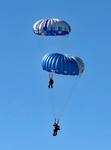 15. Smokejumpers descend on a two-man stick by Ted Corporandy