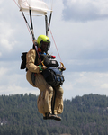 23. Close up on smokejumper landing approach on FS-14 practice jump (side view) by Ted Corporandy