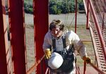 Don DeYoung climbing the jump tower at Redding Smokejumper Base by Ted Corporandy