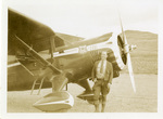 Albert Davies and a Forest Service Plane by Albert Davies