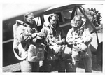 Smokejumpers in high collar jumpsuits by unknown