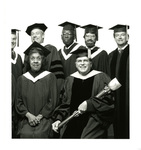 Board of Trustees and others in graduation regalia by Eastern Washington University. Publications
