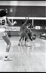 Eastern player passes out of double team by Eastern Washington University. Publications