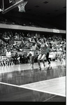 Lisa Comstock drives for a layup against Idaho State by Eastern Washington University. Publications
