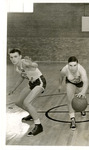 Elmer Dreischel and Bob Stoelt posing at midcourt in 1939 by Eastern Washington University