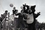 Students dancing on homecoming parade float by Eastern Washington University