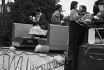 Students on Morrison Hall homecoming parade float by Eastern Washington University