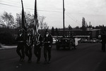 ROTC color guard marching in the homecoming parade by Eastern Washington University