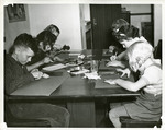 Elementary students in an art class making stamps by Eastern Washington College of Education