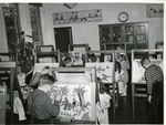 Art class with students painting on easels by Eastern Washington College of Education