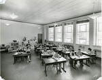 Students work at their desks in a large open classroom by Arthur T. Lacey and Eastern Washington College of Education