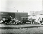 Northern Pacific Depot - unloaded automobiles by unknown