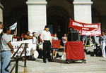 Speaker in front of the California state capitol building by Carlos Maldonado