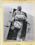 555th Parachute Infantry troop at the door of a C-47 troop carrier by United States. Army Air Forces
