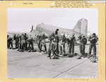 555th Parachute Infantry putting on jump gear for fighting forest fires by United States. Army Air Forces