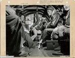 555th Parachute Infantry troopers in a troop carrier by Edgar W. Weinberger and United States. Army Air Forces