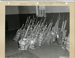 Fire fighting equipment packed for parachute deployment by the 555th Parachute Infantry Battalion by Edgar W. Weinberger and United States. Army Air Forces