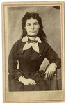 Woman with Dark hair and Dress with White Collar