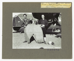 Jump pants held before Stinson Reliant by Harold C. King