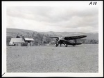 Stinson Reliant on air strip by unknown